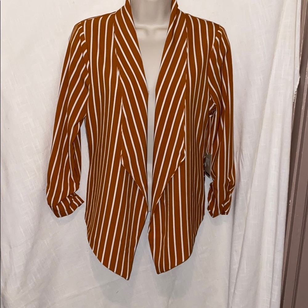 Size S women’s polyester brown and white top.